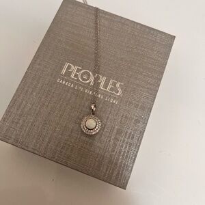Sterling silver with gem pendant & chain. From peoples.